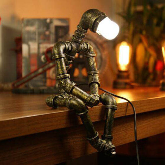 Retro przemysłowa lampa stołowa w kształcie robota