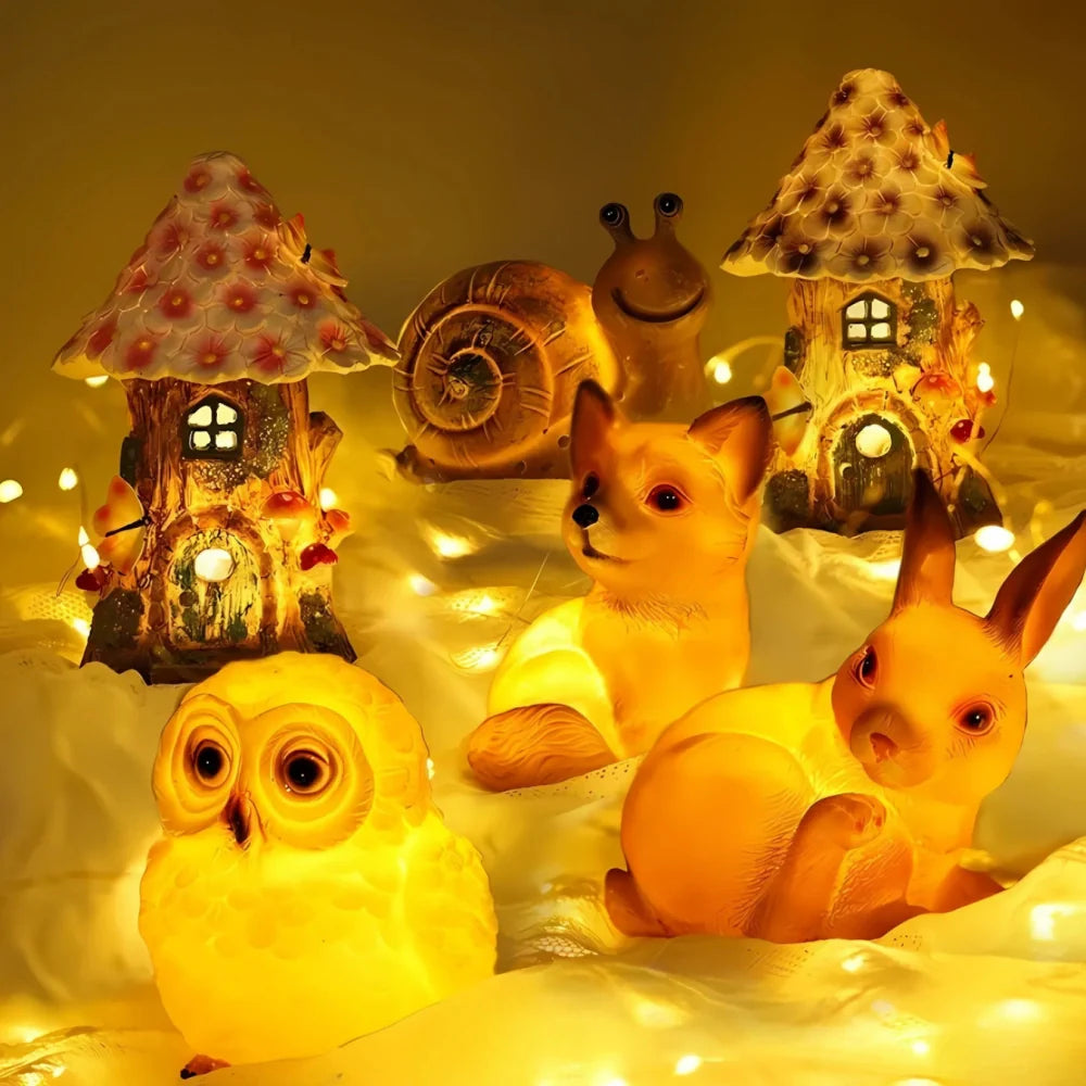 Decorative LED garden lamp with animal motif, solar powered