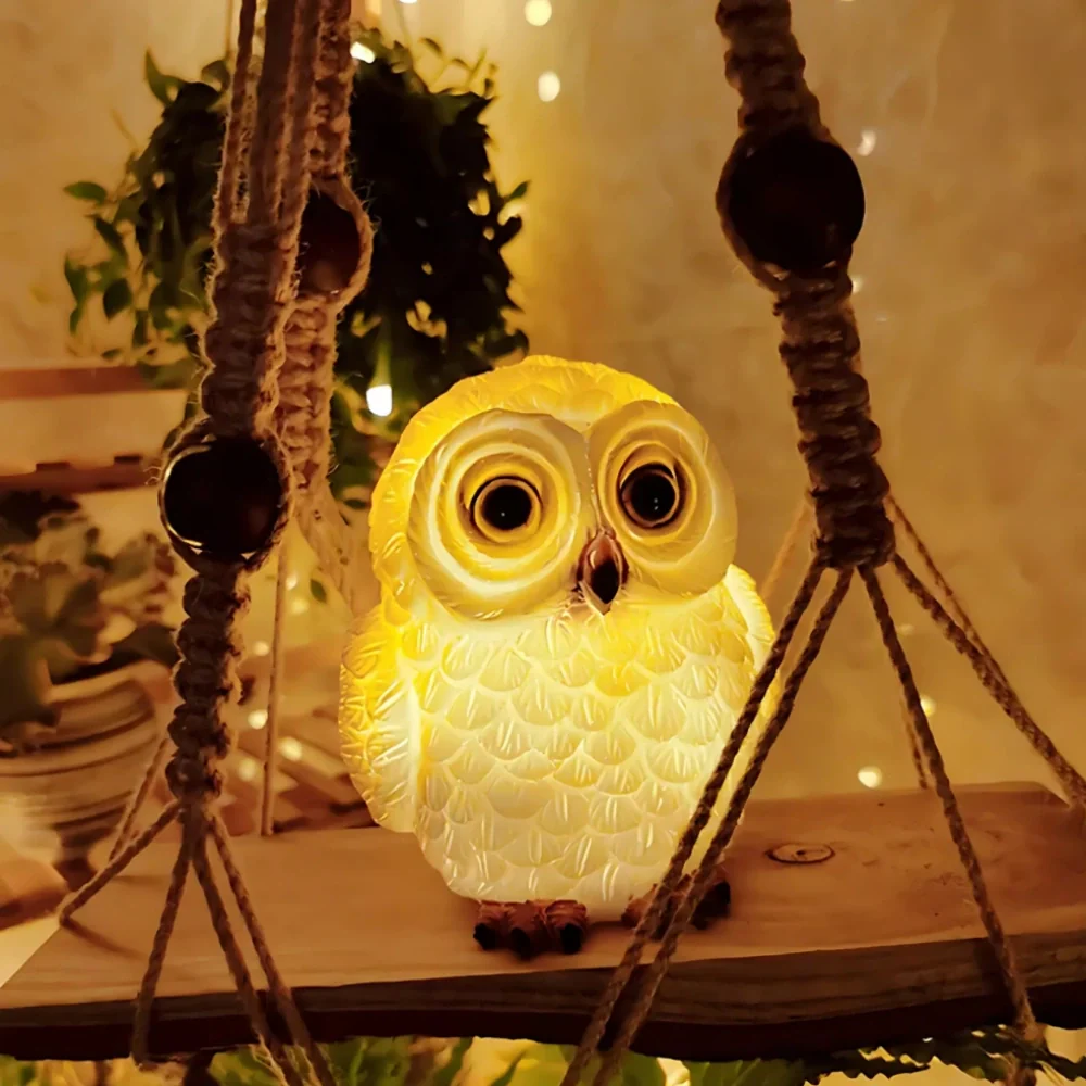 Decorative LED garden lamp with animal motif, solar powered