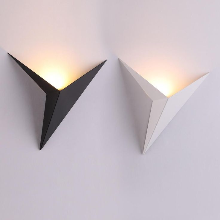 Minimalist wall lamp in the shape of a triangle with the option of warm or cool light