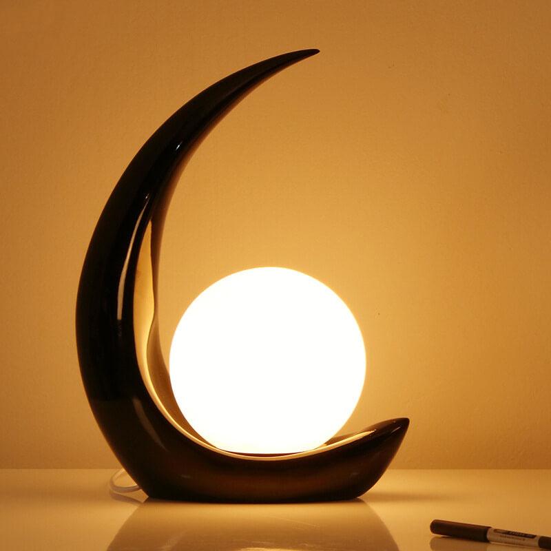 Nowoczesna lampka nocna w kształcie półksiężyca z szklanym kloszem