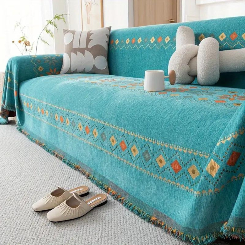 Modny koc z frędzlami w stylu boho na sofę i łóżko
