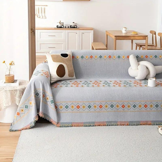 Modny koc z frędzlami w stylu boho na sofę i łóżko