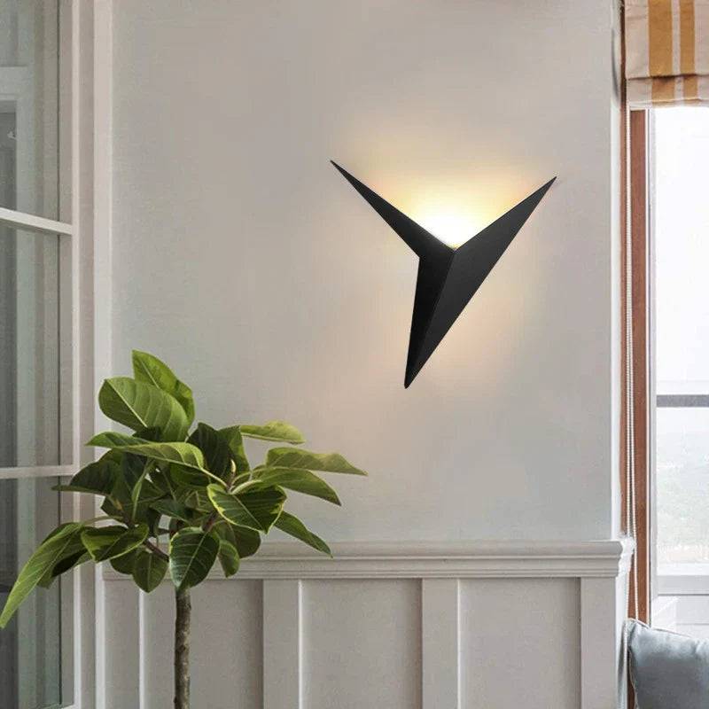 Minimalist wall lamp in the shape of a triangle with the option of warm or cool light