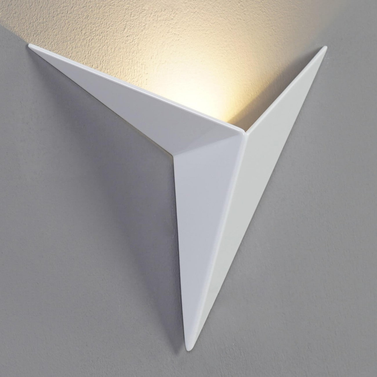Minimalist wall lamp in the shape of a triangle with the option of warm or cool light