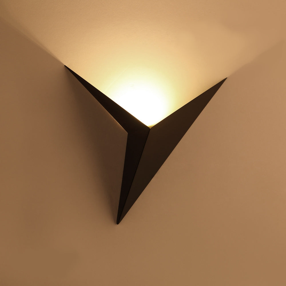 Minimalist wall lamp in the shape of a triangle with the option of warm or cool light